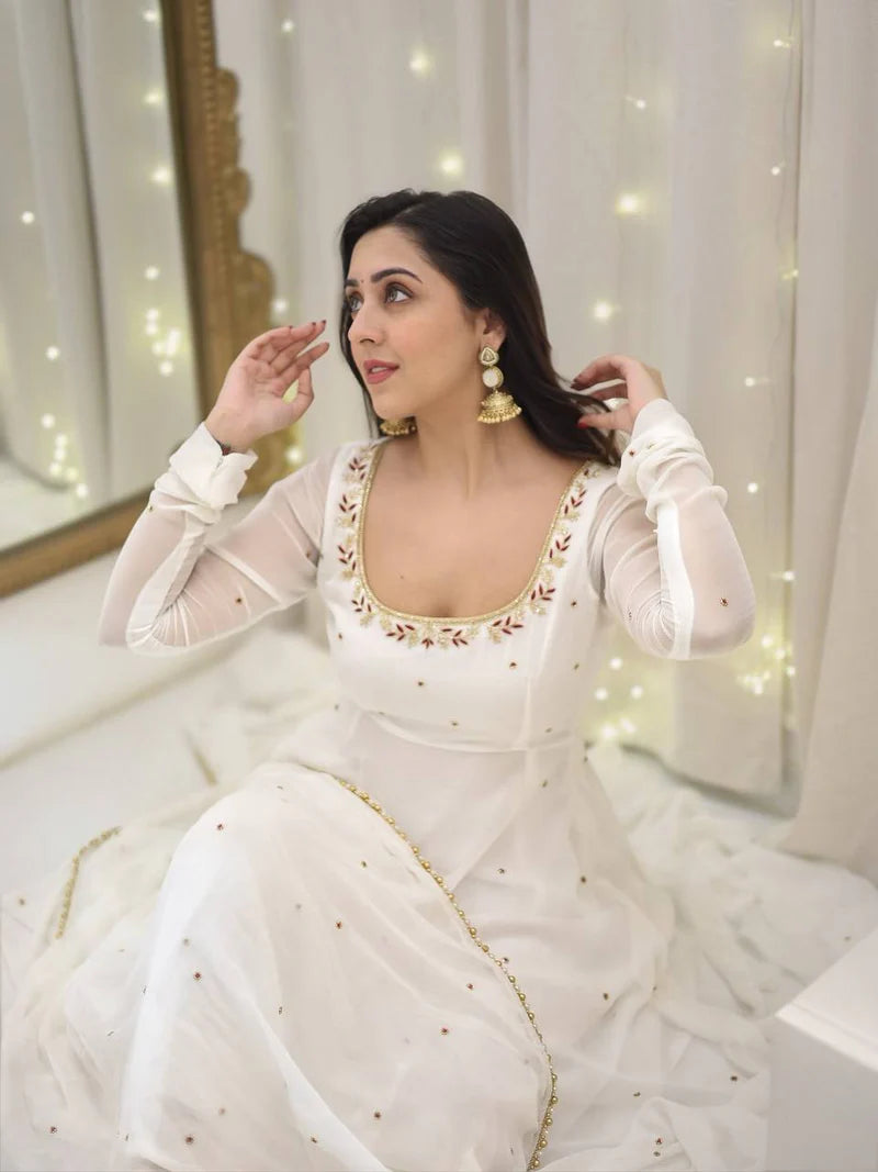 Ivory Designer Plazzo Suit – Soft Elegance – Graceful Flow – Festive Perfection